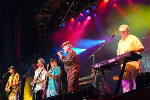 Patrick Kelly takes the stage with Mike Love in 2006.<br /><em>Photo courtesy of Professional Liability Underwriting Society</em>