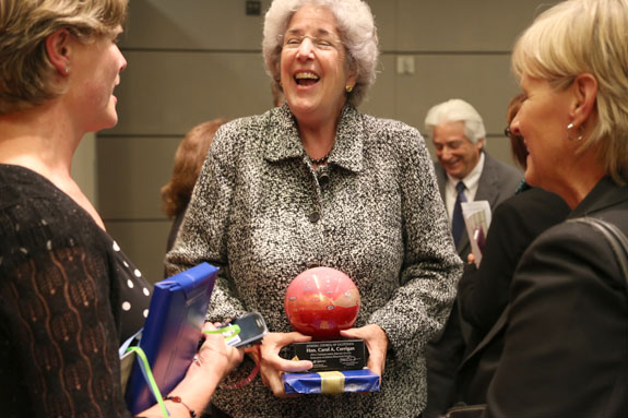 Supreme Court Justice Carol A. Corrigan (center) received an award for excellence in judicial education.