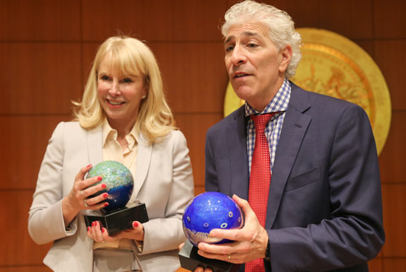 Tricia Ann Bigelow, presiding justice of the 2nd District Court of Appeal, shows off the Ronald M. George Award for Judicial Excellence, while Beverly Hills attorney Paul Kiesel holds the Stanley Mosk Defender of Justice Award.