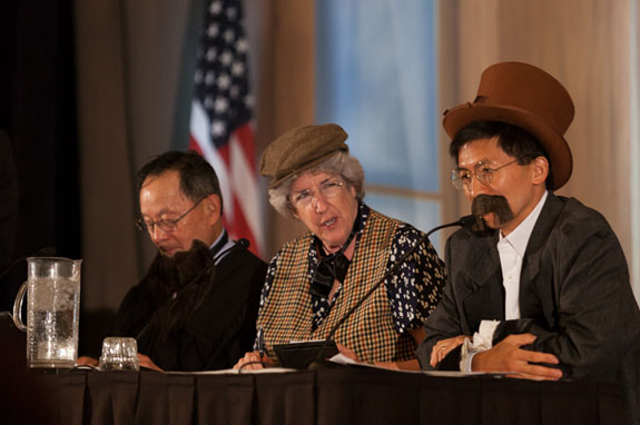 Justice Carol A. Corrigan, portraying a reporter, questions Justice Goodwin Liu’s character. Also in the photo is Justice Ming Chin.