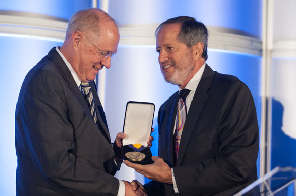 Supreme Court Justice Anthony Kennedy, left, receives the Witkin medal from State Bar President David Pasternak.    <em>Photo by S. Todd Rogers</em>